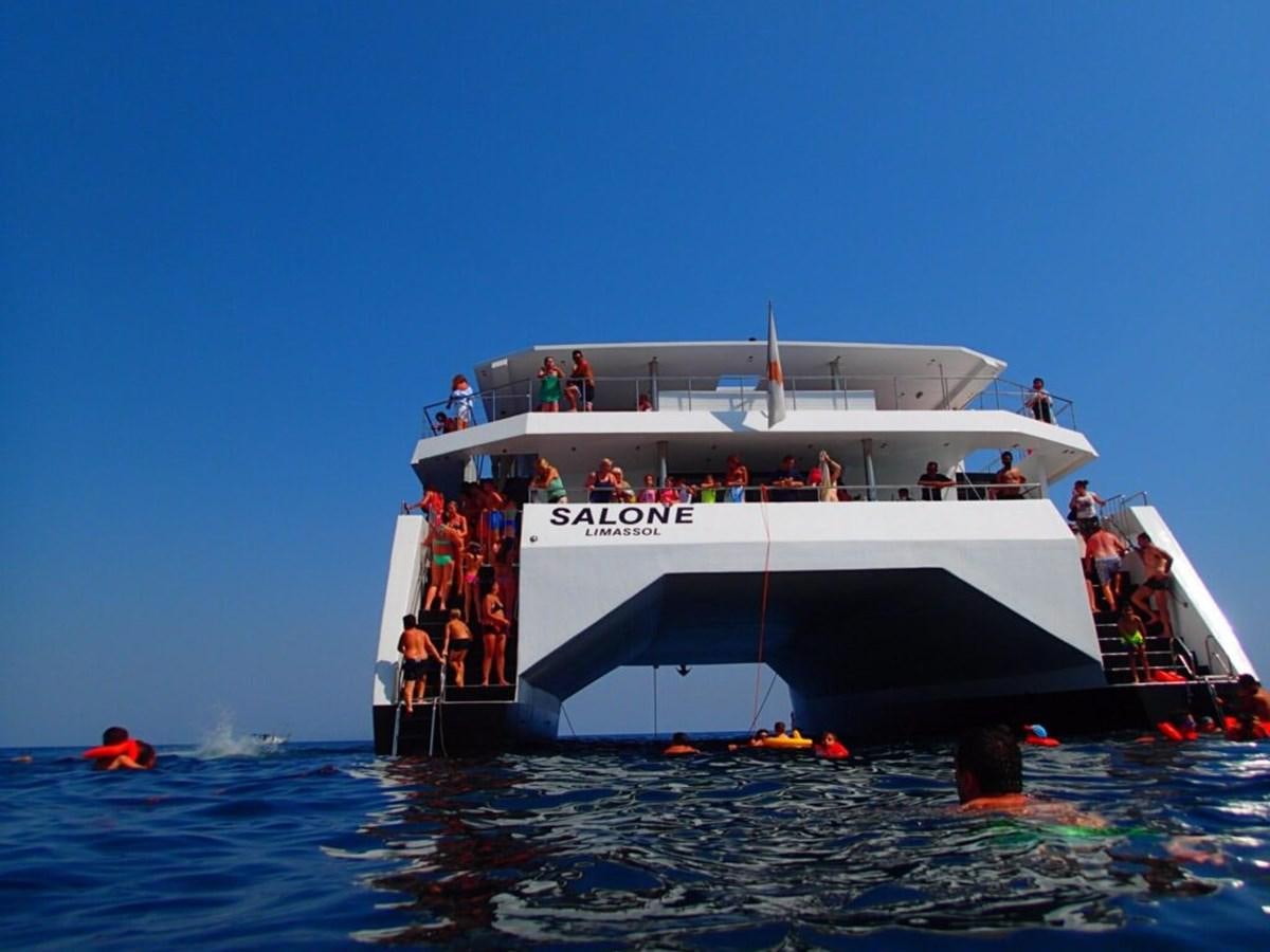 a group of people on a boat aboard SALONE Yacht for Sale