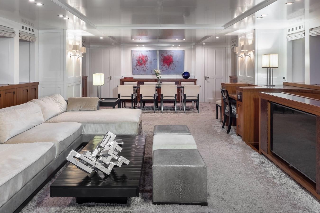 a living room with a couch and a piano aboard EVERGREEN G Yacht for Sale
