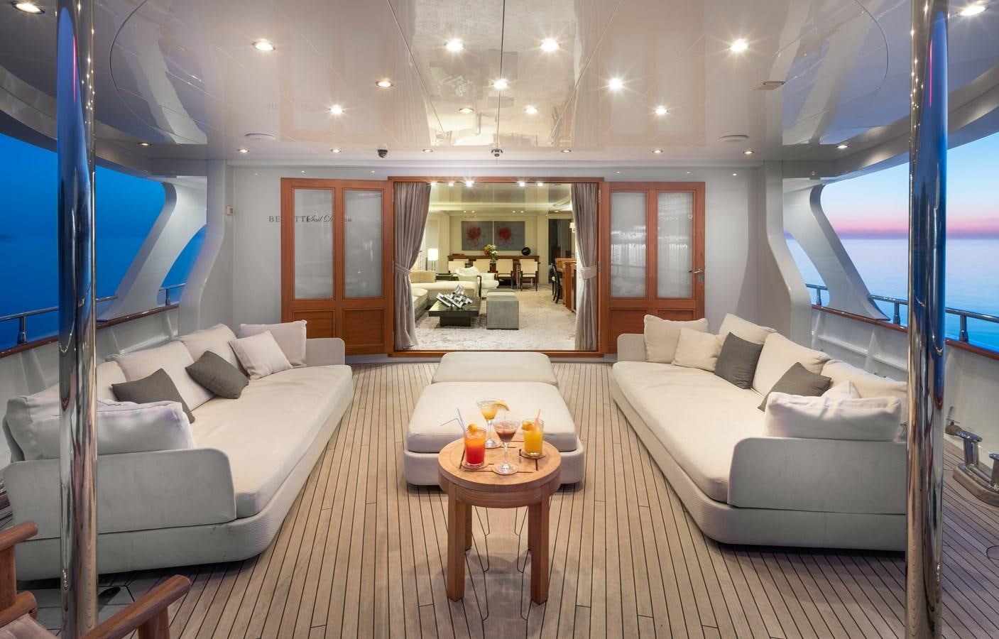 a living room with a couch and a table aboard EVERGREEN G Yacht for Sale