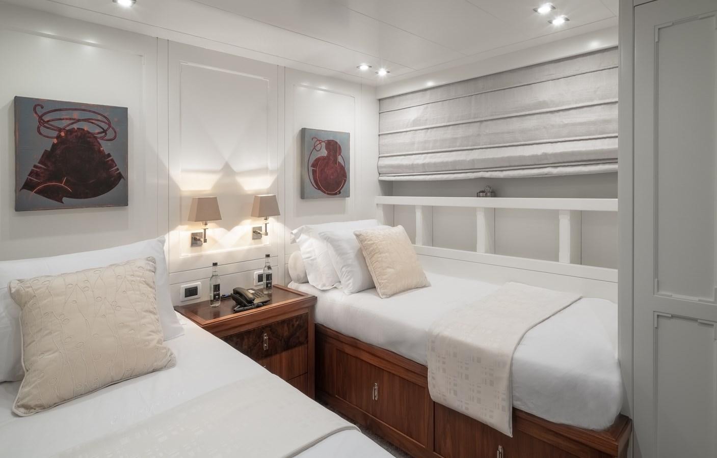 a room with two beds aboard EVERGREEN G Yacht for Sale