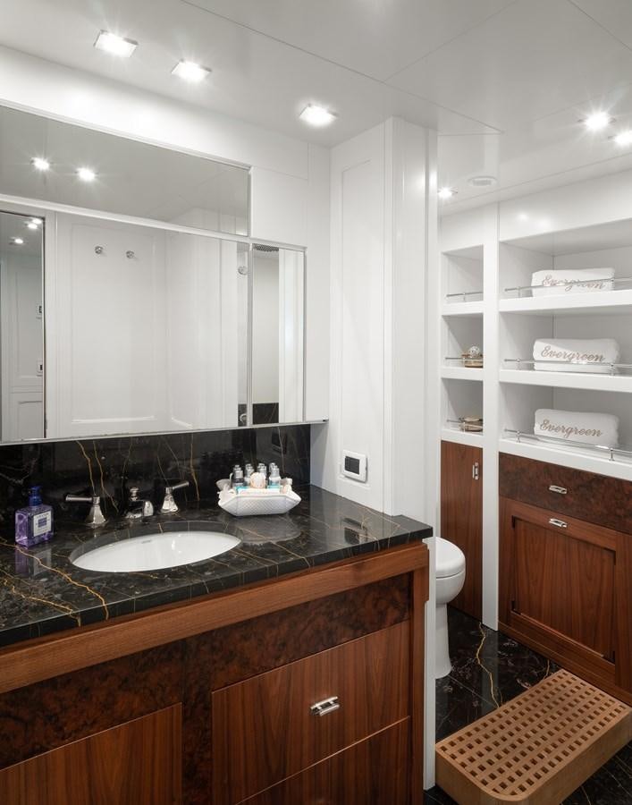 a kitchen with a sink and cabinets aboard EVERGREEN G Yacht for Sale