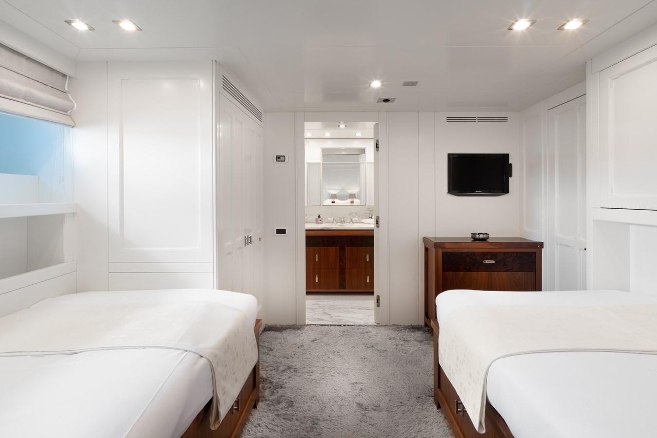 a room with white beds aboard EVERGREEN G Yacht for Sale