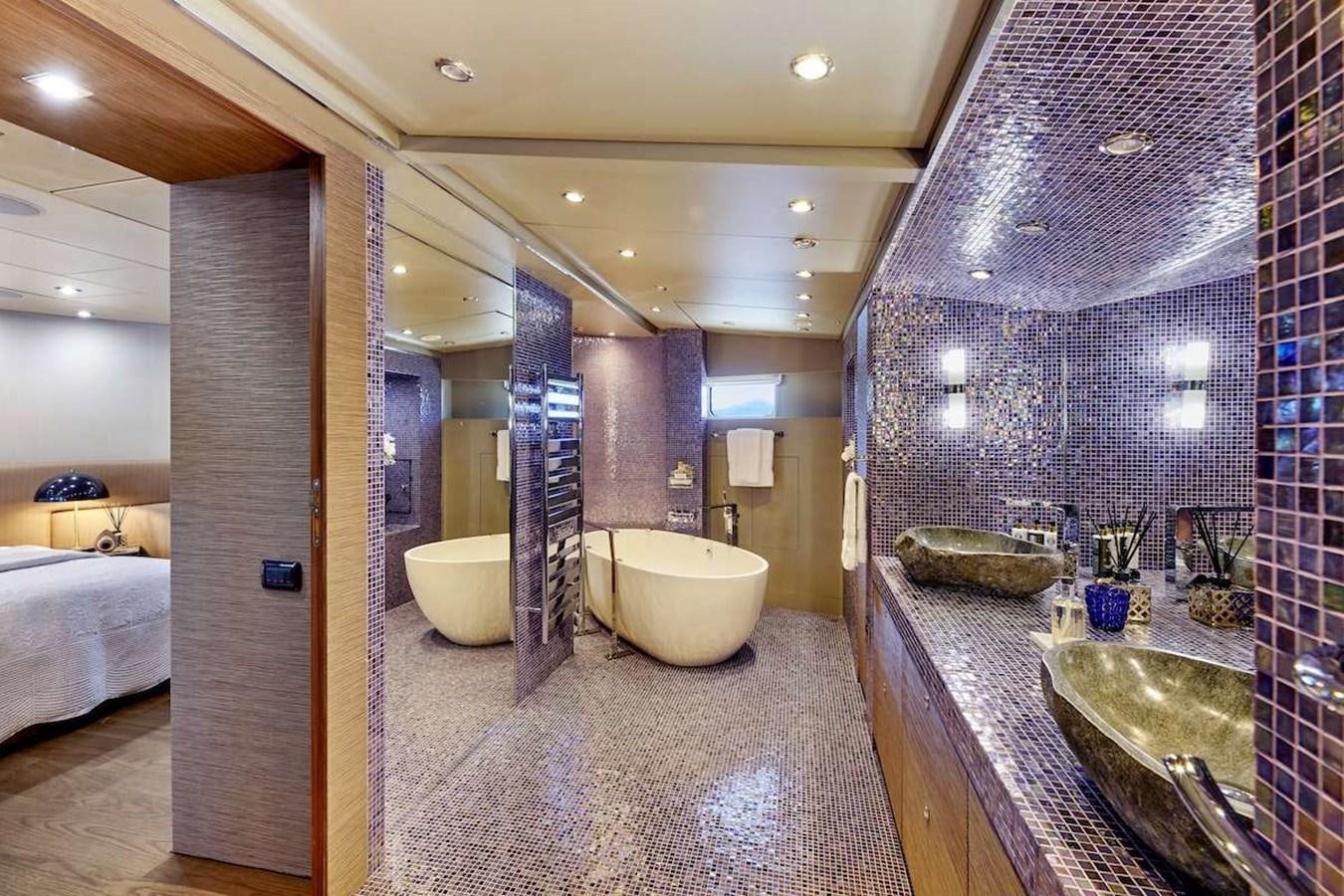 a bathroom with a large mirror aboard DALOLI Yacht for Sale