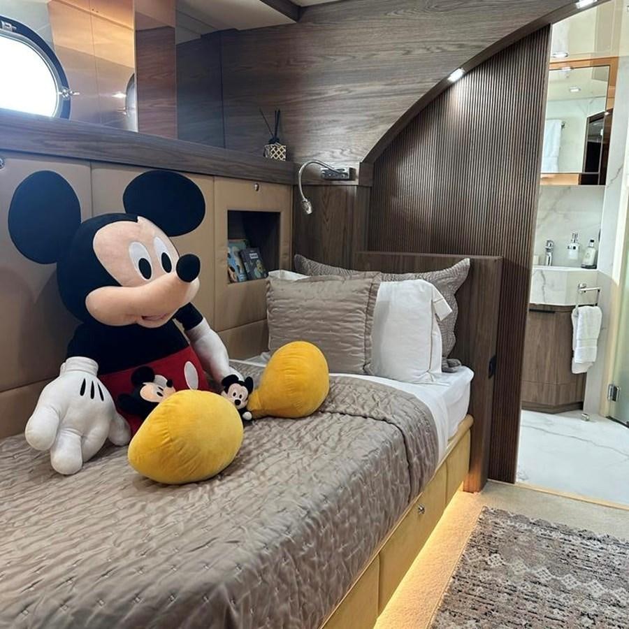 a group of stuffed animals on a bed aboard DALOLI Yacht for Sale