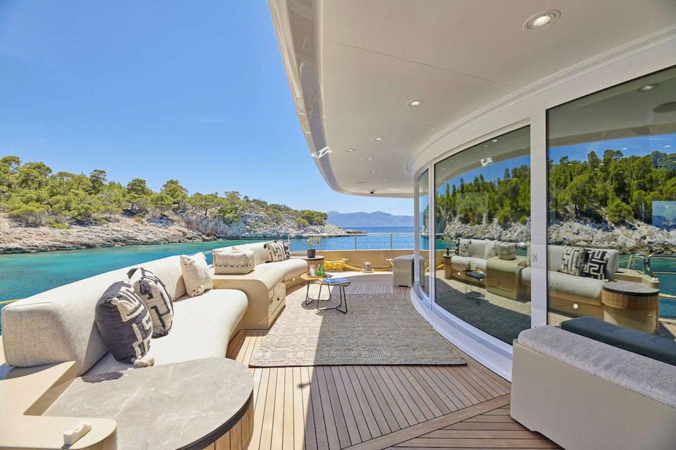 a living room with a large window aboard DALOLI Yacht for Sale