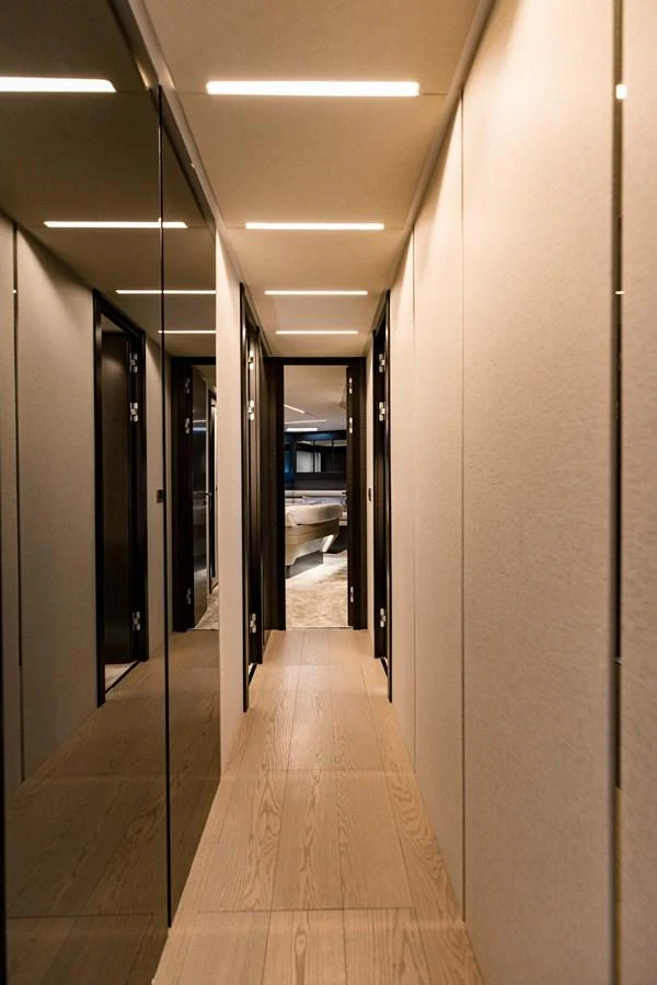 a hallway with doors aboard STALLION Yacht for Sale