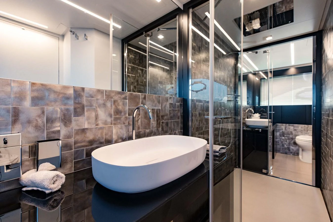 a bathroom with a large tub aboard STALLION Yacht for Sale