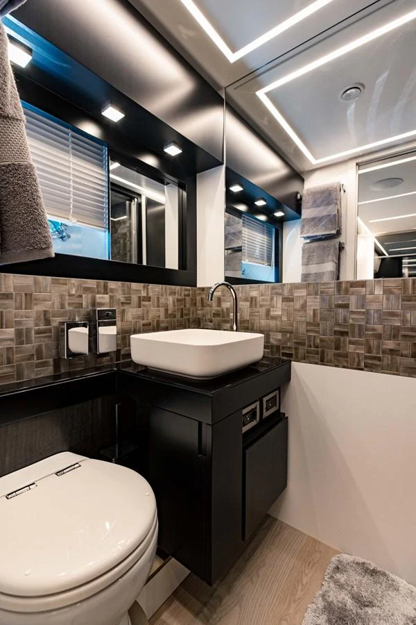 a bathroom with a sink and a toilet aboard STALLION Yacht for Sale