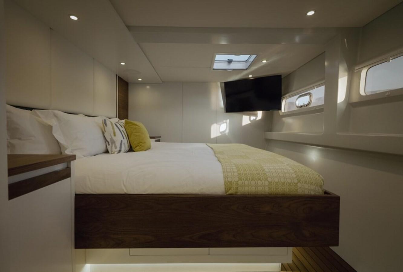 a bed in a room aboard SALTY Yacht for Sale