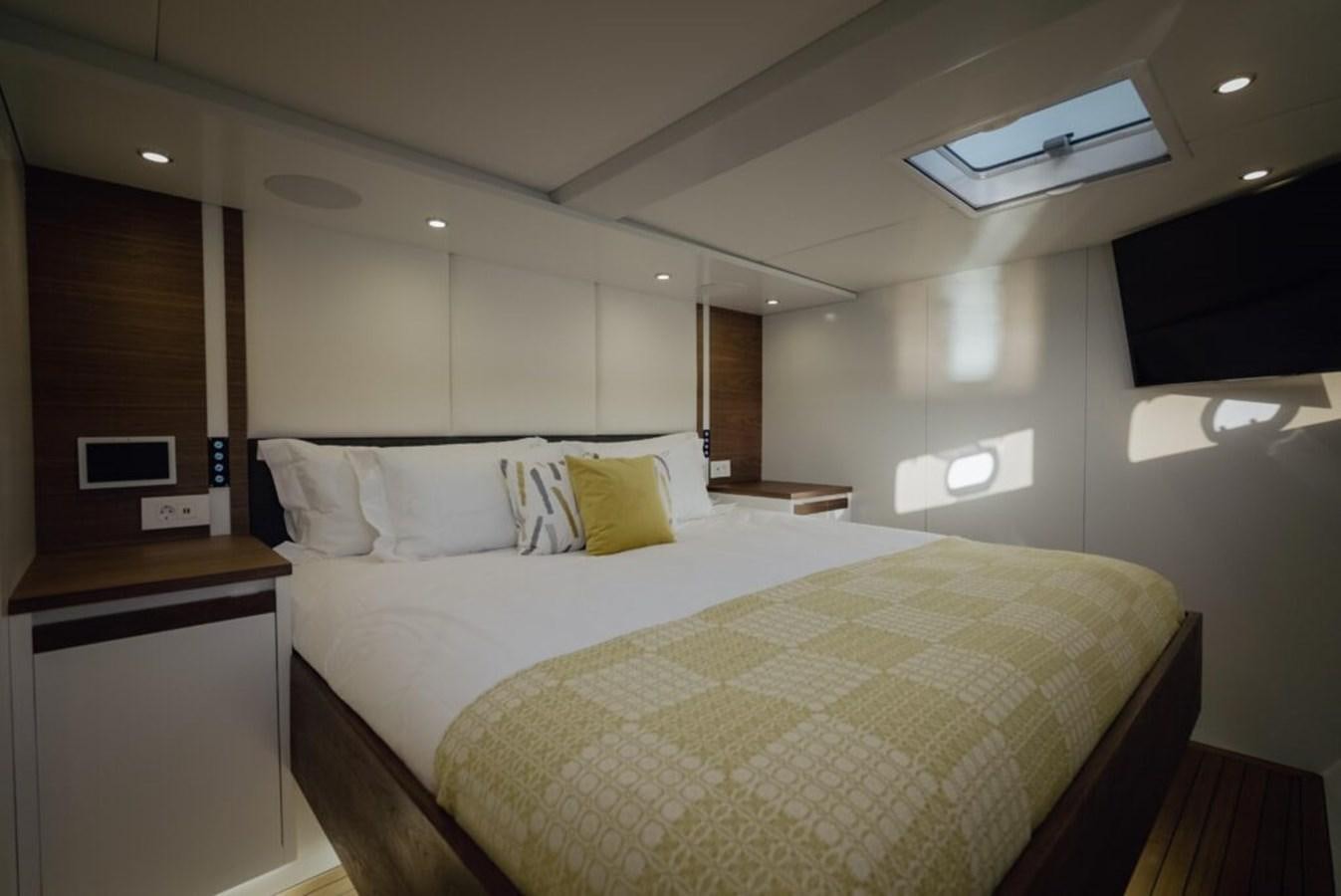 a bed in a room aboard SALTY Yacht for Sale
