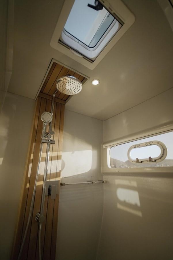 a light fixture on a ceiling aboard SALTY Yacht for Sale
