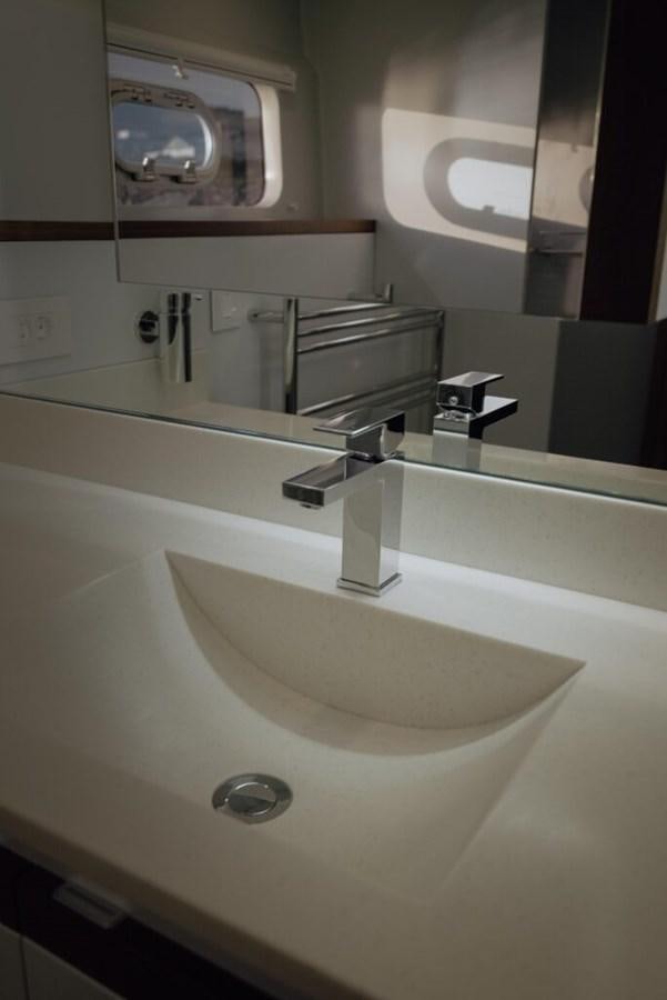 a sink with a faucet aboard SALTY Yacht for Sale
