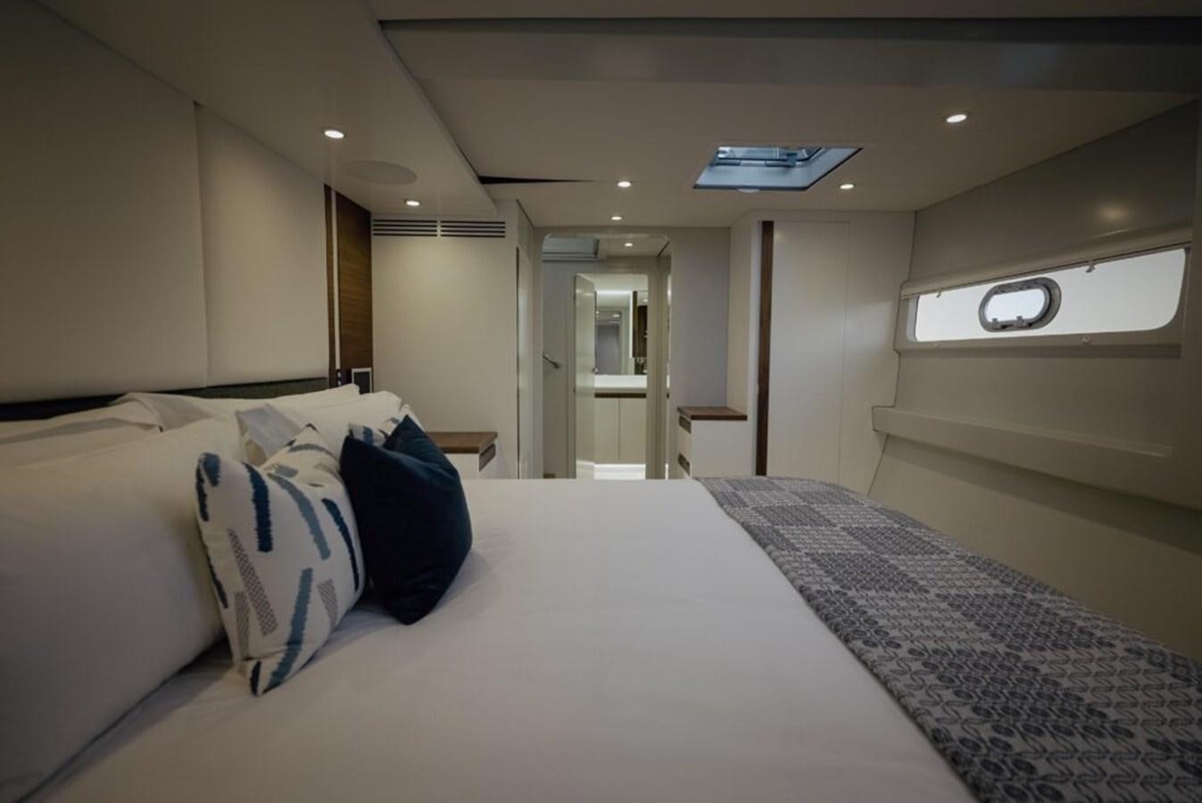 a hotel room with a bed aboard SALTY Yacht for Sale