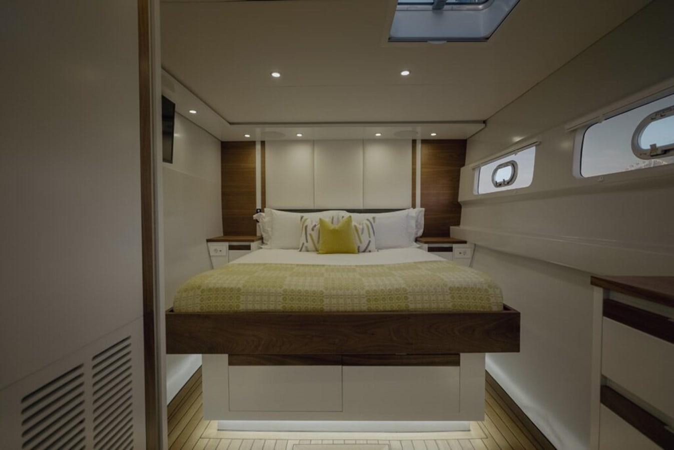 a bed in a room aboard SALTY Yacht for Sale