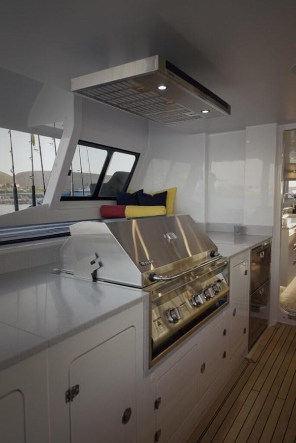 a kitchen with a large island aboard SALTY Yacht for Sale