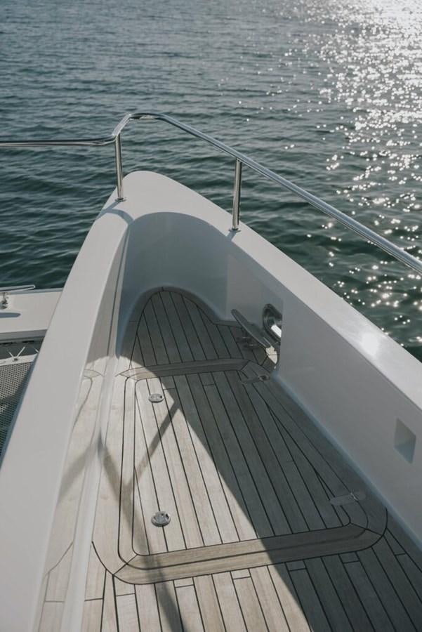 a white boat on the water aboard SALTY Yacht for Sale