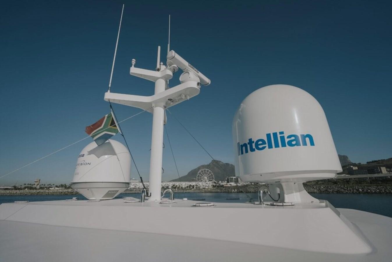 a white satellite dish on a rooftop aboard SALTY Yacht for Sale