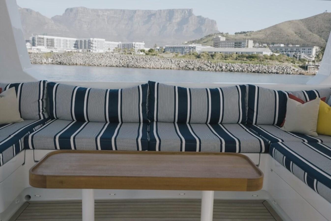 a deck overlooking a city aboard SALTY Yacht for Sale