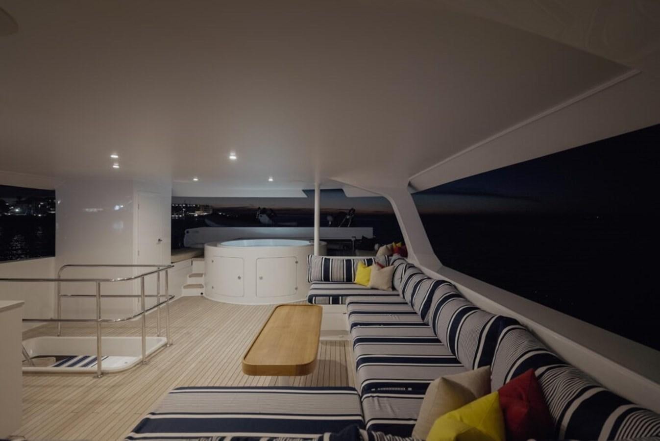 a room with a bed and a desk aboard SALTY Yacht for Sale