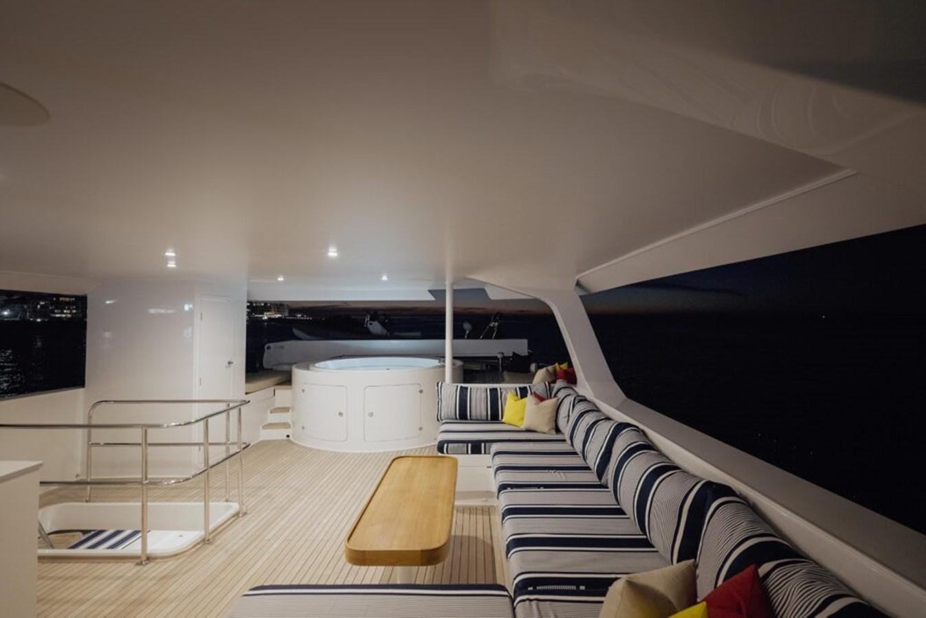 a room with a staircase and a large window aboard SALTY Yacht for Sale