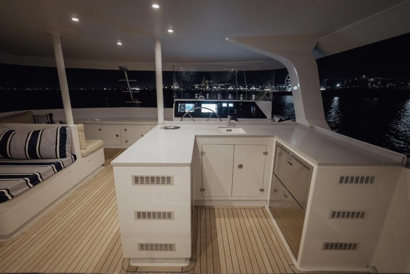 a room with a bed and a desk aboard SALTY Yacht for Sale