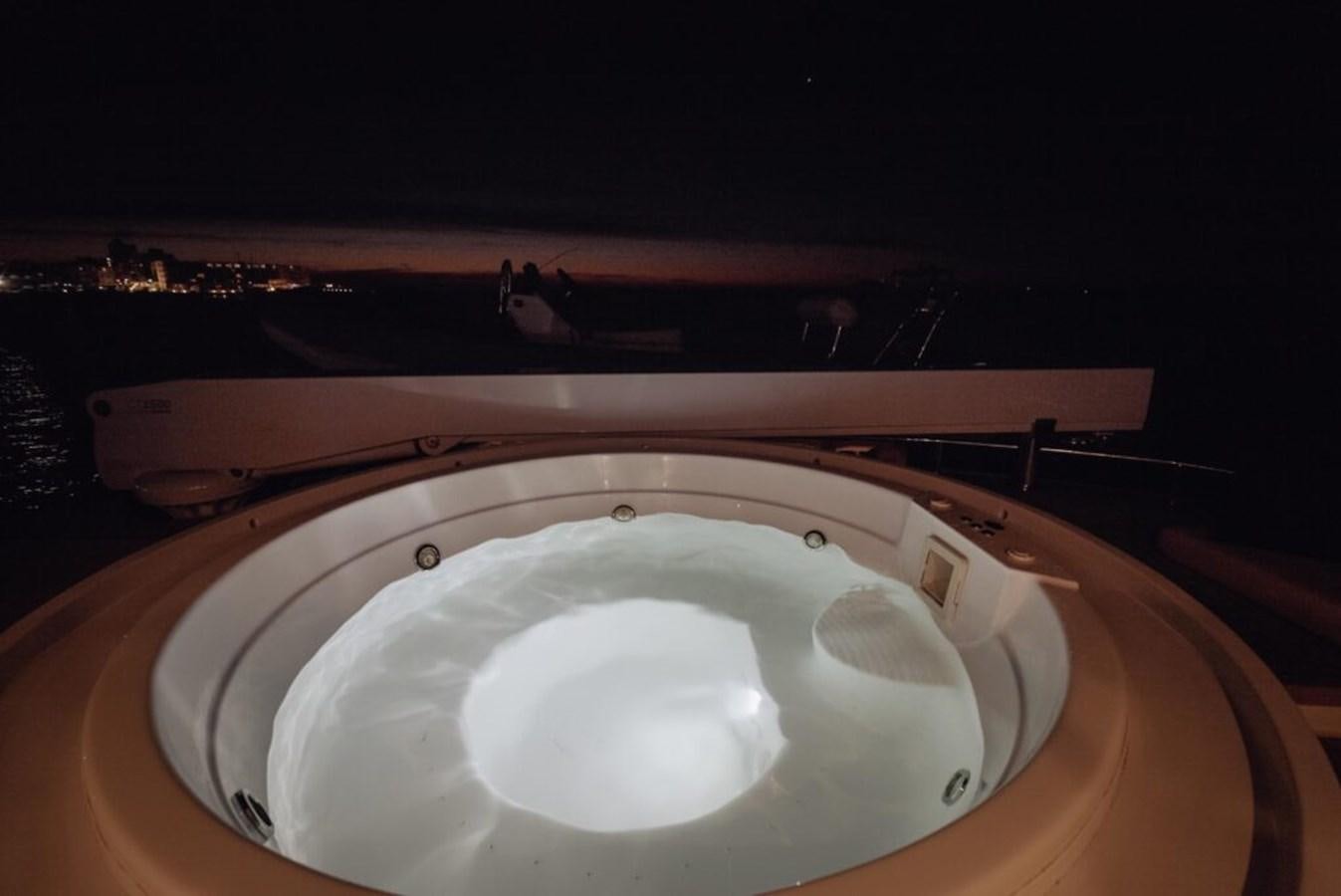 a circular white object on a wooden surface aboard SALTY Yacht for Sale