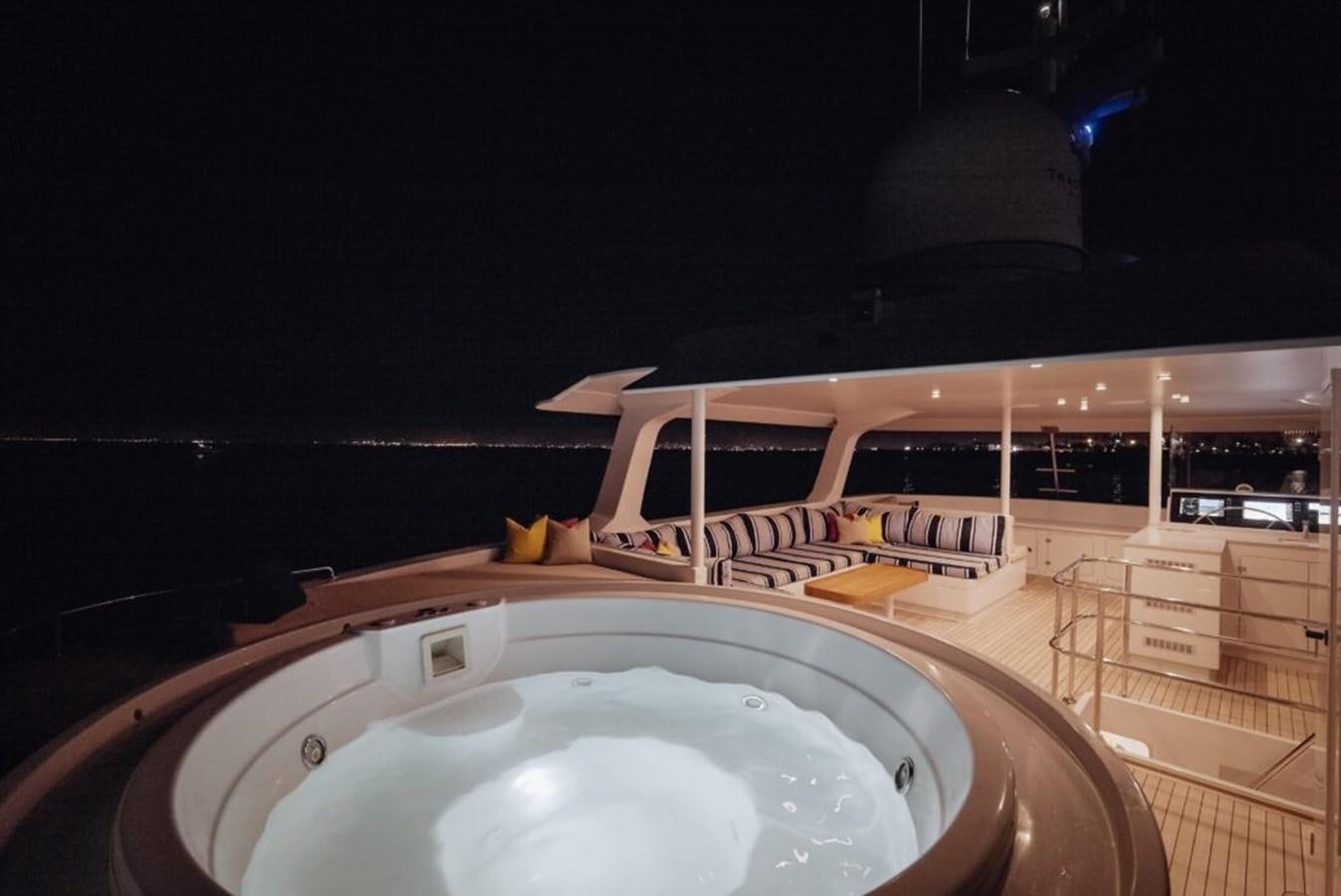 a large white building with a pool aboard SALTY Yacht for Sale