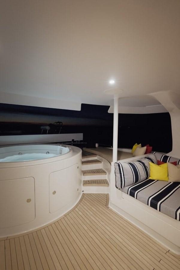 a room with a sink and a bed aboard SALTY Yacht for Sale