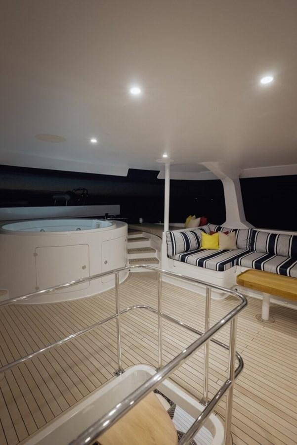 a room with a bed and a large bed aboard SALTY Yacht for Sale