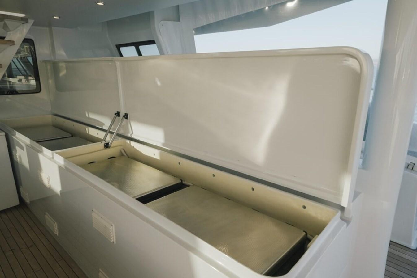 a large white cabinet with a sink aboard SALTY Yacht for Sale