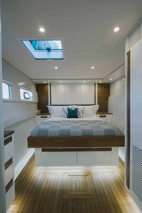 a bed in a room aboard SALTY Yacht for Sale
