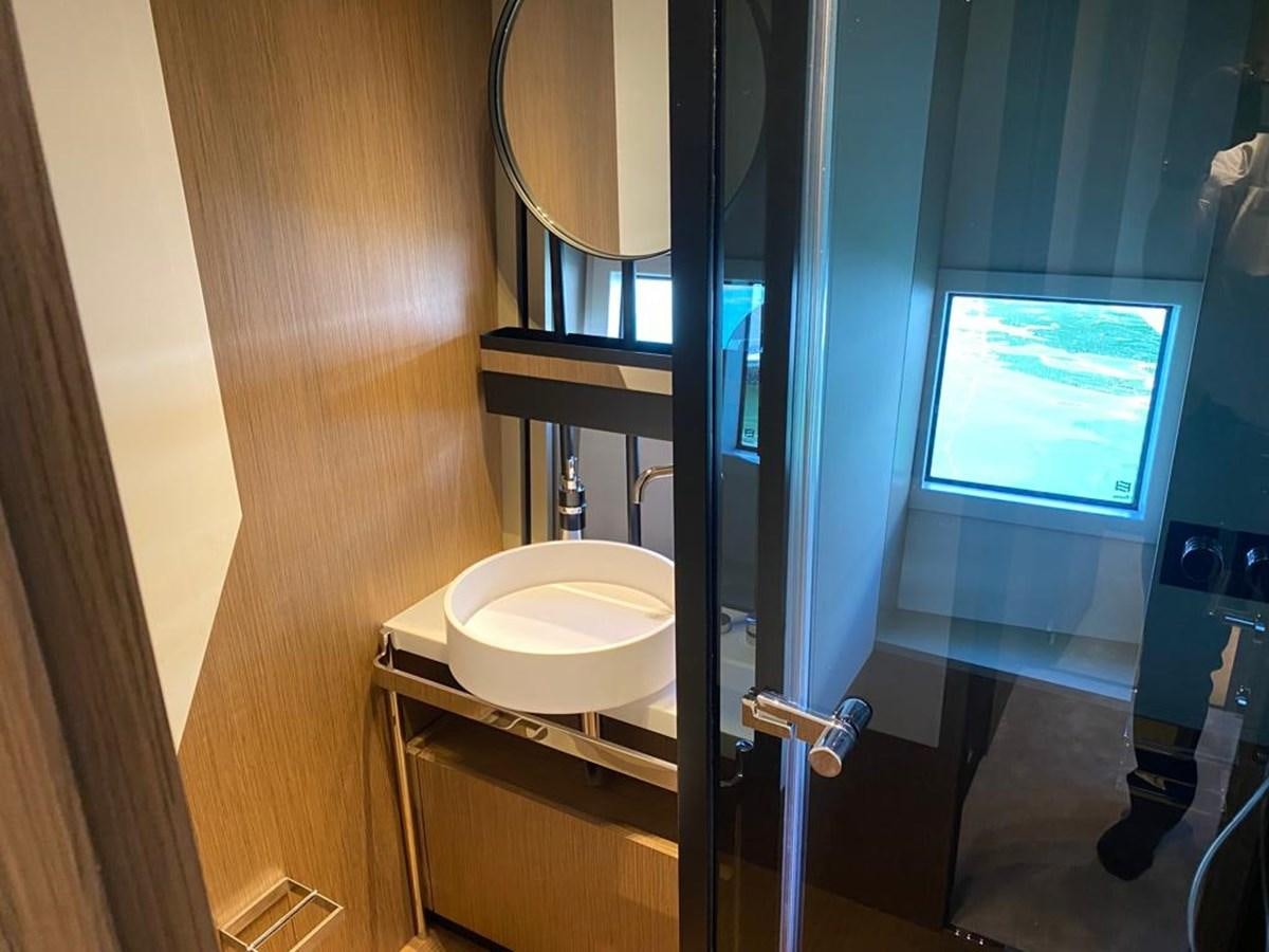a bathroom with a sink and a mirror aboard MY ANGEL Yacht for Sale