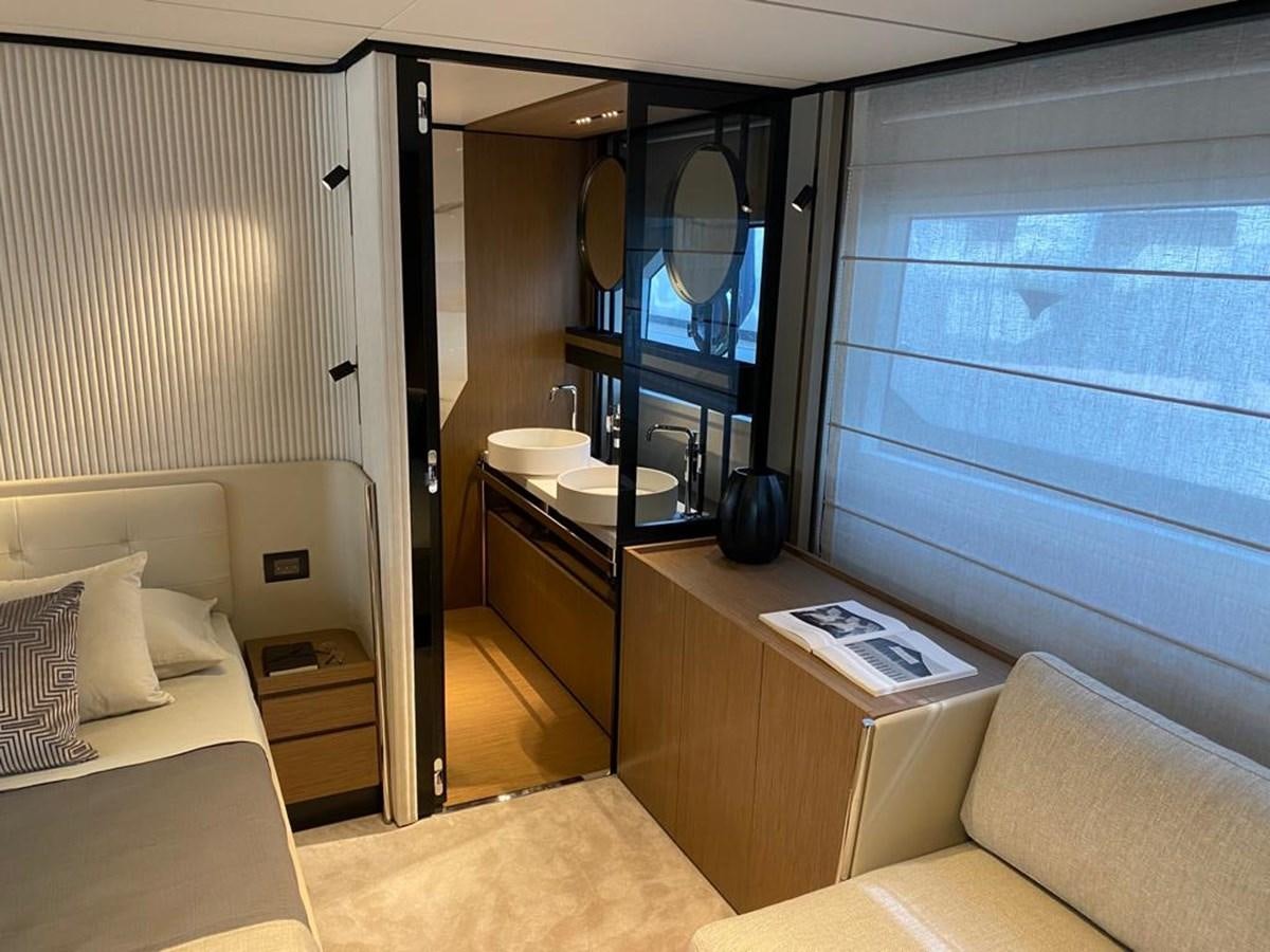 a room with a bed and a desk aboard MY ANGEL Yacht for Sale
