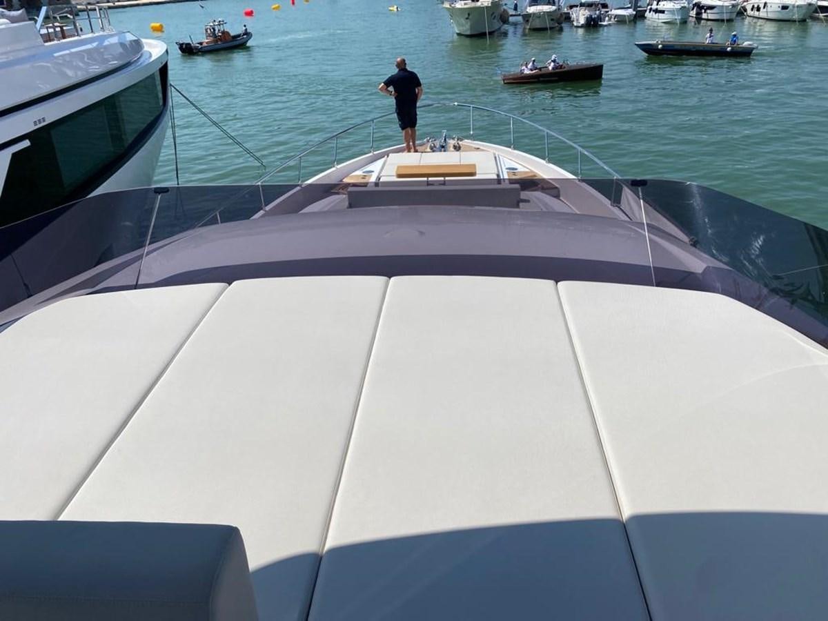a white boat with a person standing on it aboard MY ANGEL Yacht for Sale