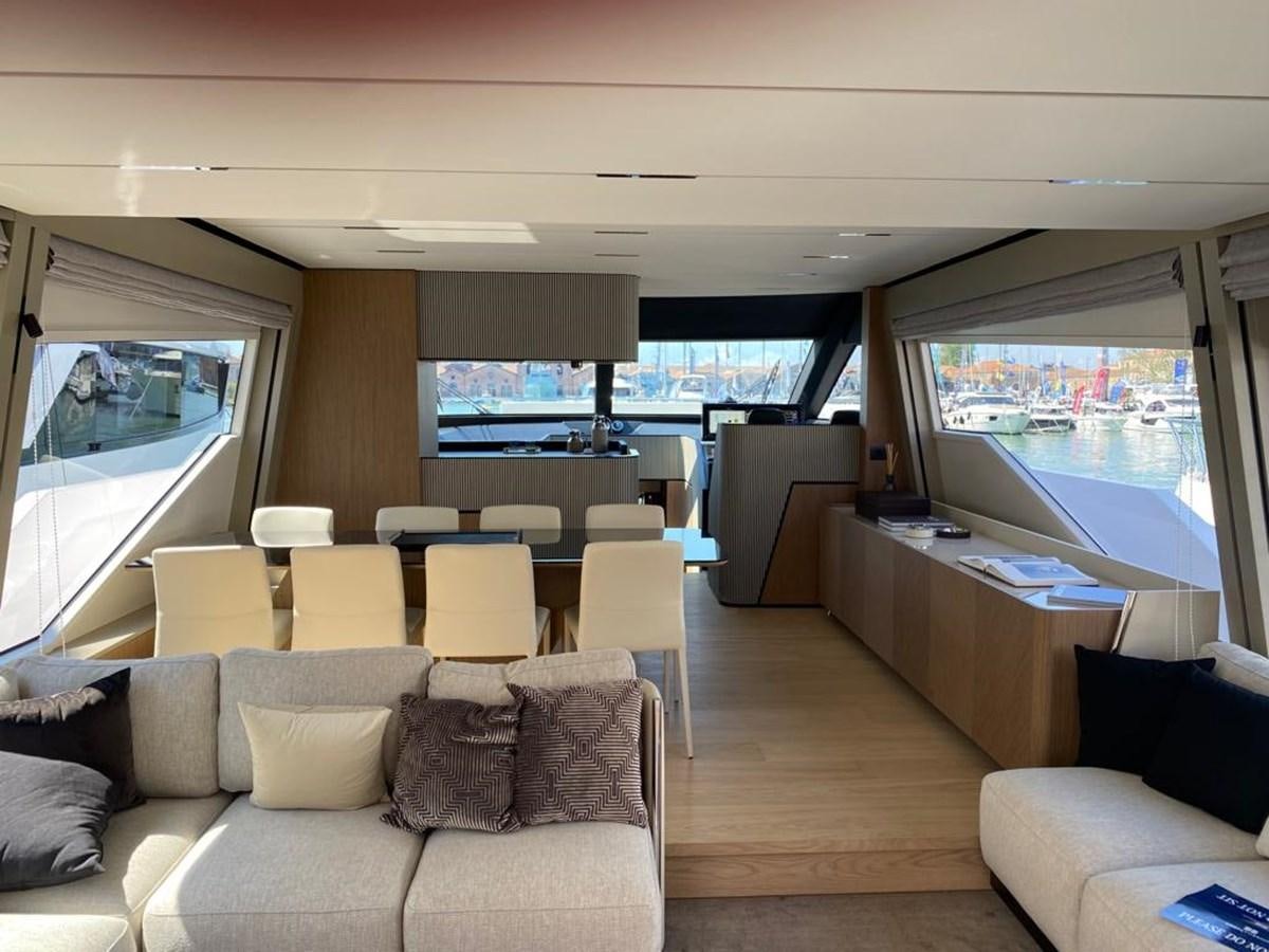 a living room with a large screen aboard MY ANGEL Yacht for Sale