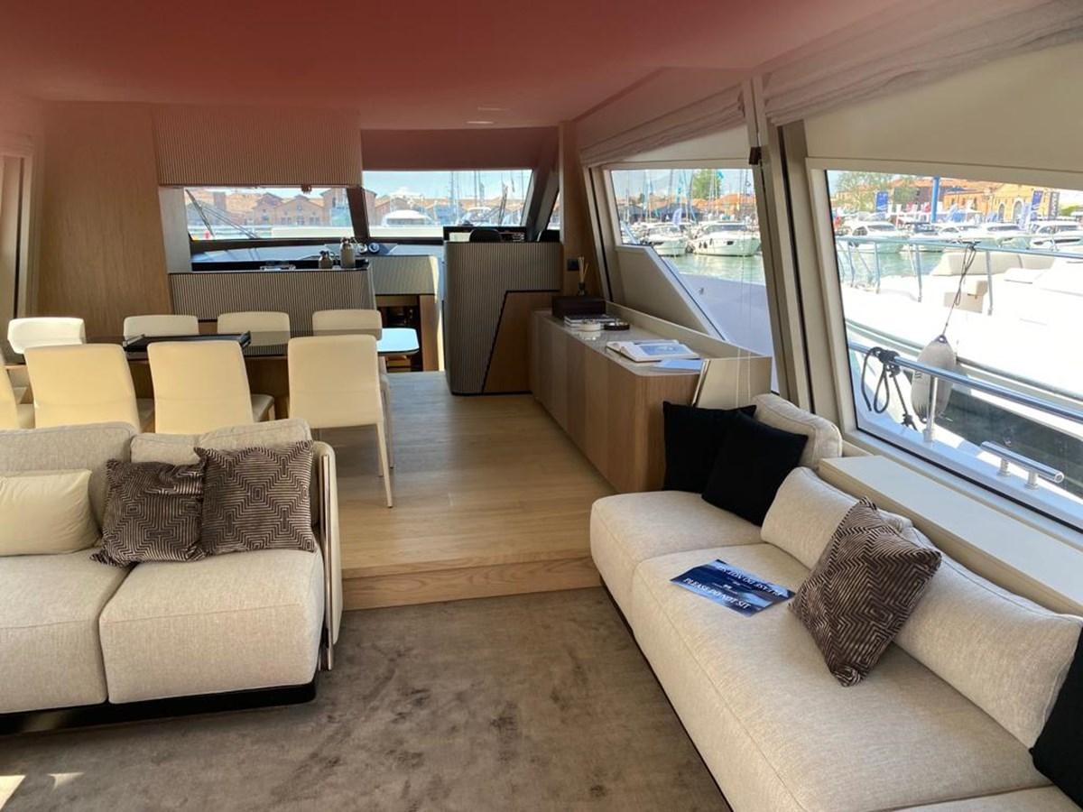 a living room with a large window aboard MY ANGEL Yacht for Sale