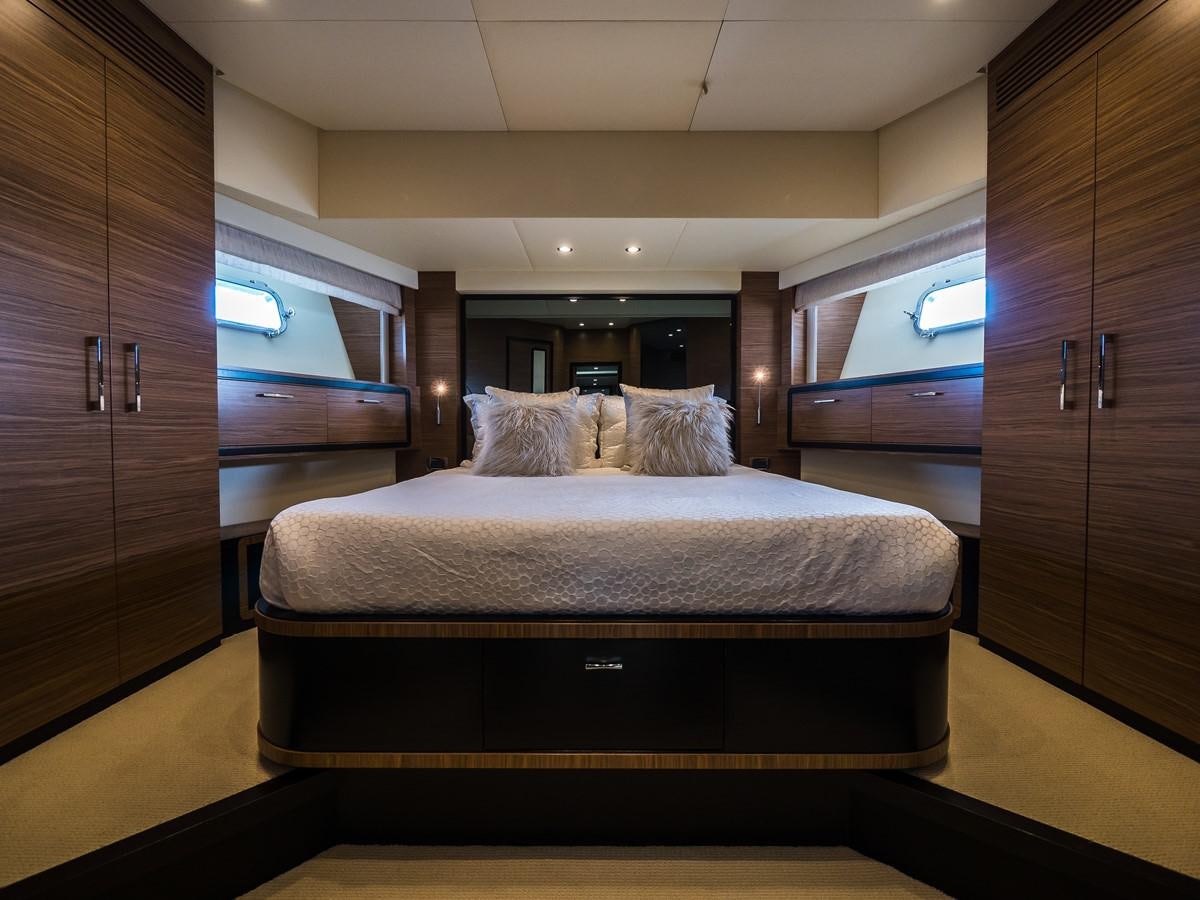 a bed in a room aboard 2016 AZIMUT 76 MAGELLANO THE EQUITES Yacht for Sale