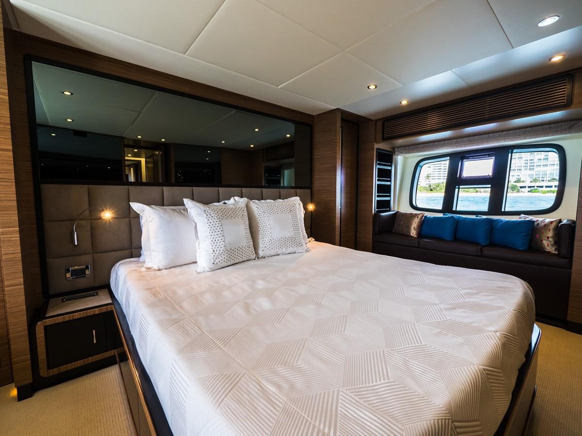 a bed in a room aboard 2016 AZIMUT 76 MAGELLANO THE EQUITES Yacht for Sale