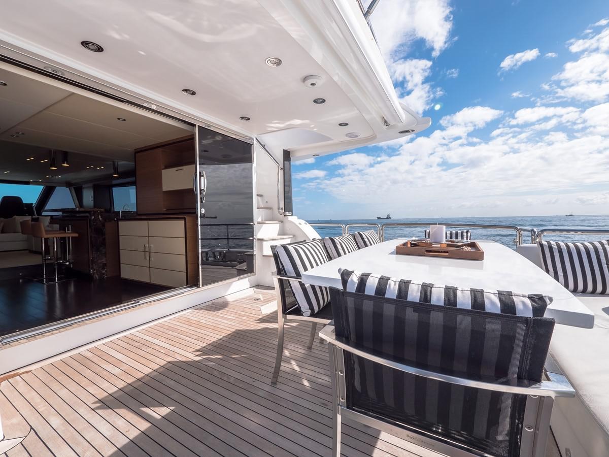 a large balcony overlooking the ocean aboard 2016 AZIMUT 76 MAGELLANO THE EQUITES Yacht for Sale