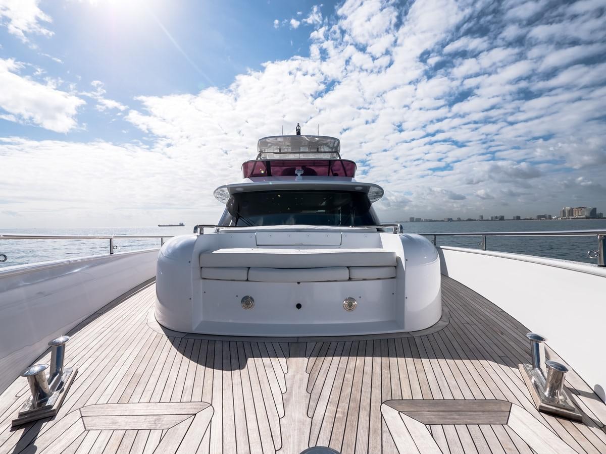 a white car on a boat aboard 2016 AZIMUT 76 MAGELLANO THE EQUITES Yacht for Sale