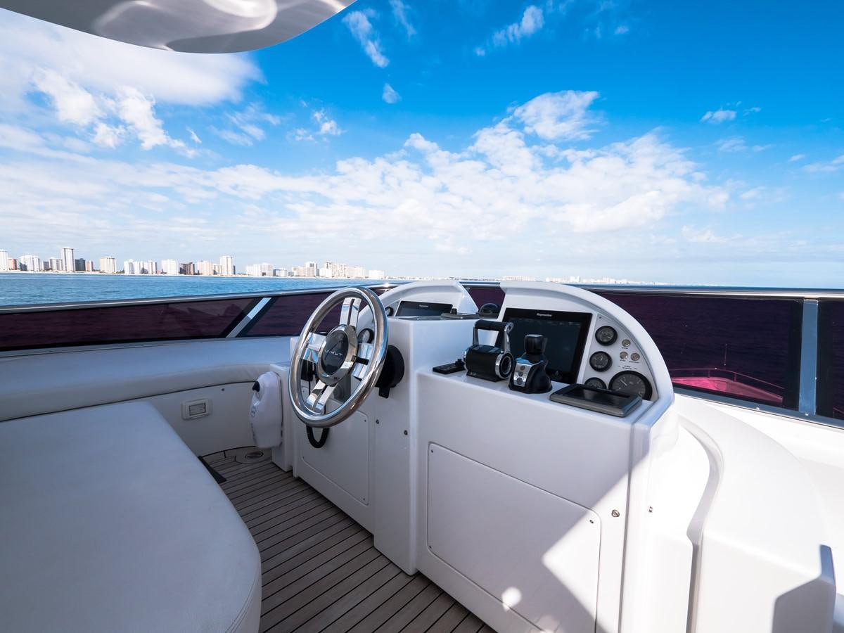a car on a road aboard 2016 AZIMUT 76 MAGELLANO THE EQUITES Yacht for Sale