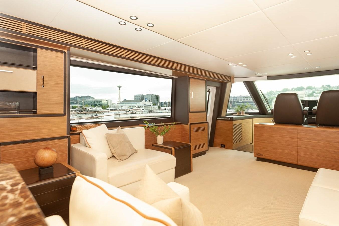 a room with a large window and a view of the city aboard 2016 AZIMUT 76 MAGELLANO THE EQUITES Yacht for Sale