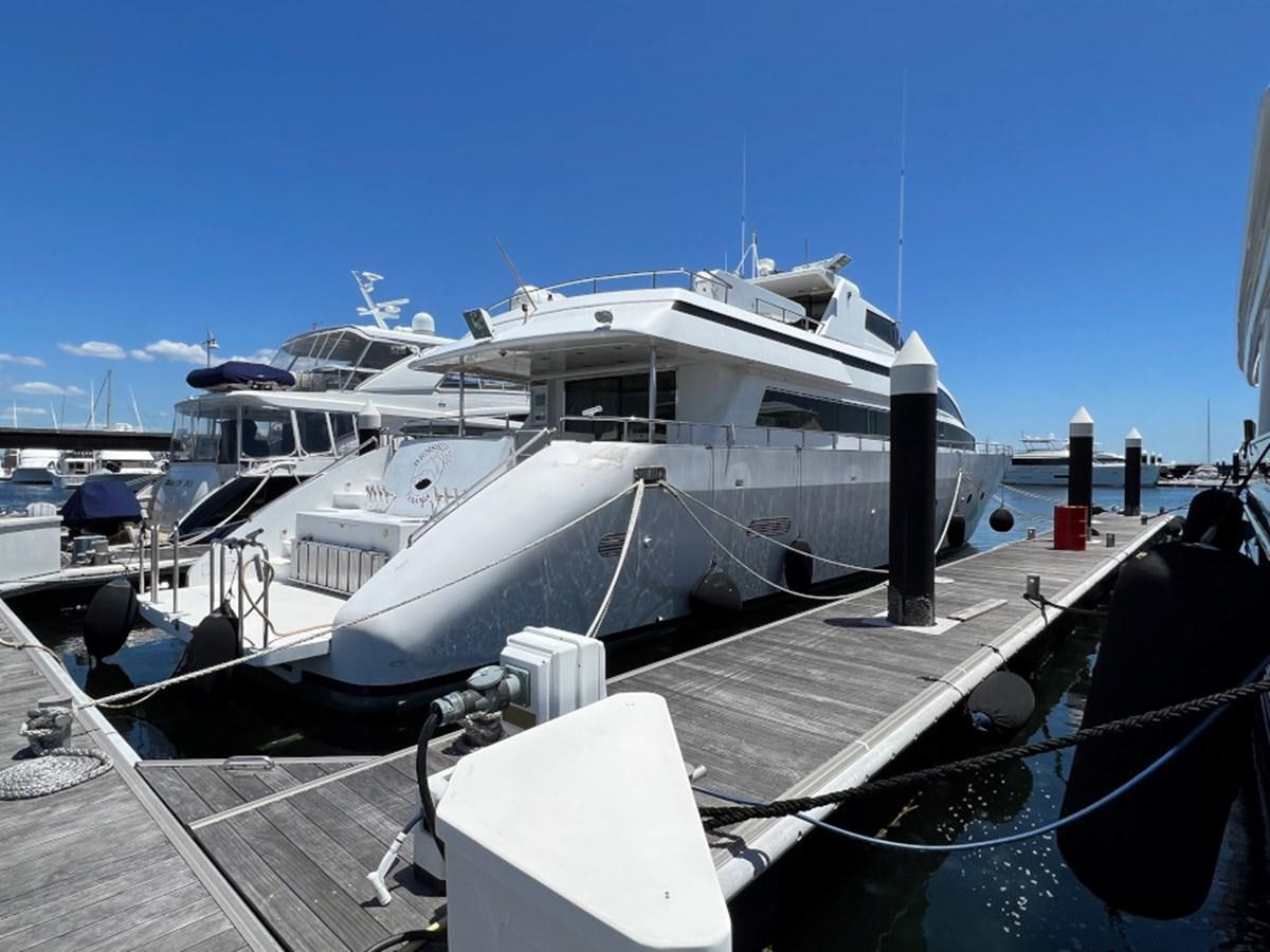 a boat docked at a pier aboard BENSHIP 101 Yacht for Sale