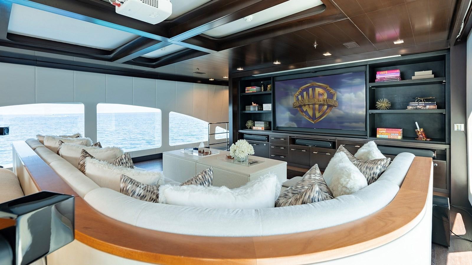 a room with a large tv aboard LOTUS Yacht for Sale