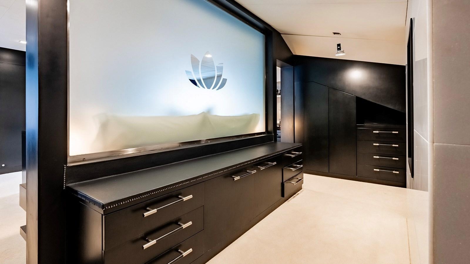 a room with a large tv aboard LOTUS Yacht for Sale