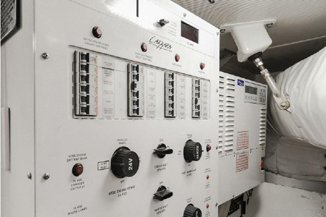 a white board with black buttons aboard 2007 LAZZARA 84 MOTOR Yacht for Sale