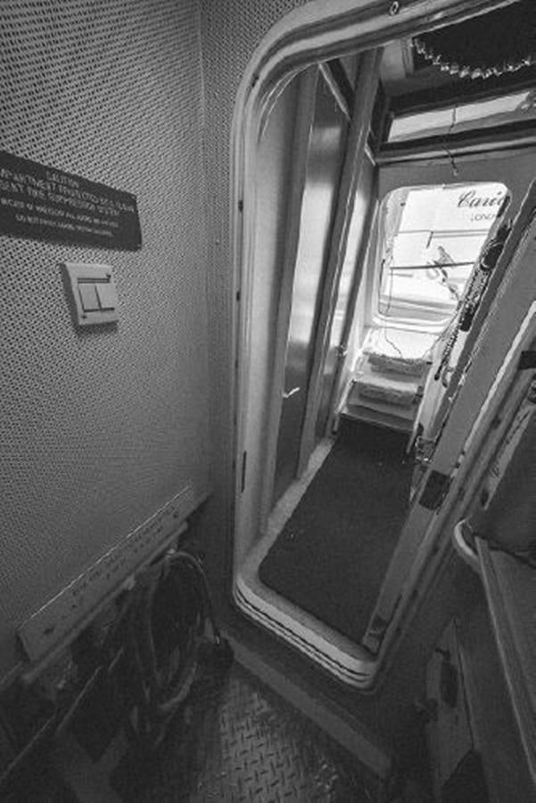 a door with a handle aboard 2007 LAZZARA 84 MOTOR Yacht for Sale