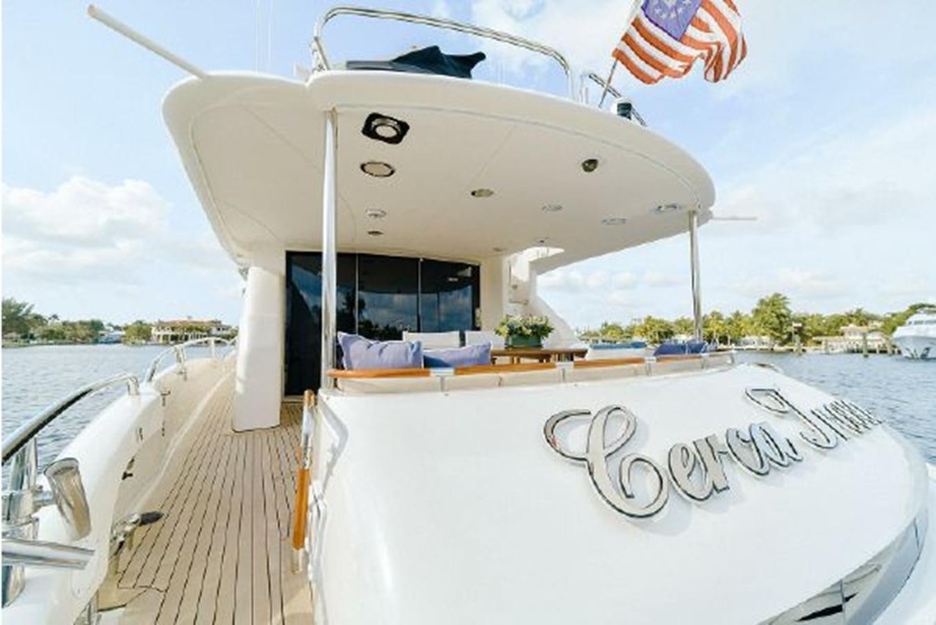a boat on a dock aboard 2007 LAZZARA 84 MOTOR Yacht for Sale