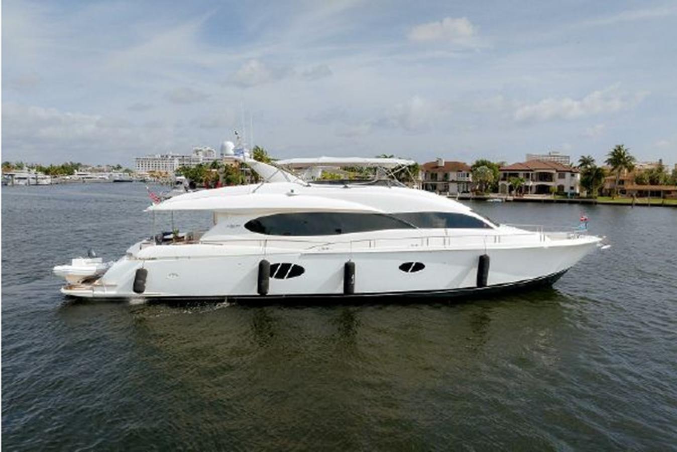 a white yacht in the water aboard 2007 LAZZARA 84 MOTOR Yacht for Sale