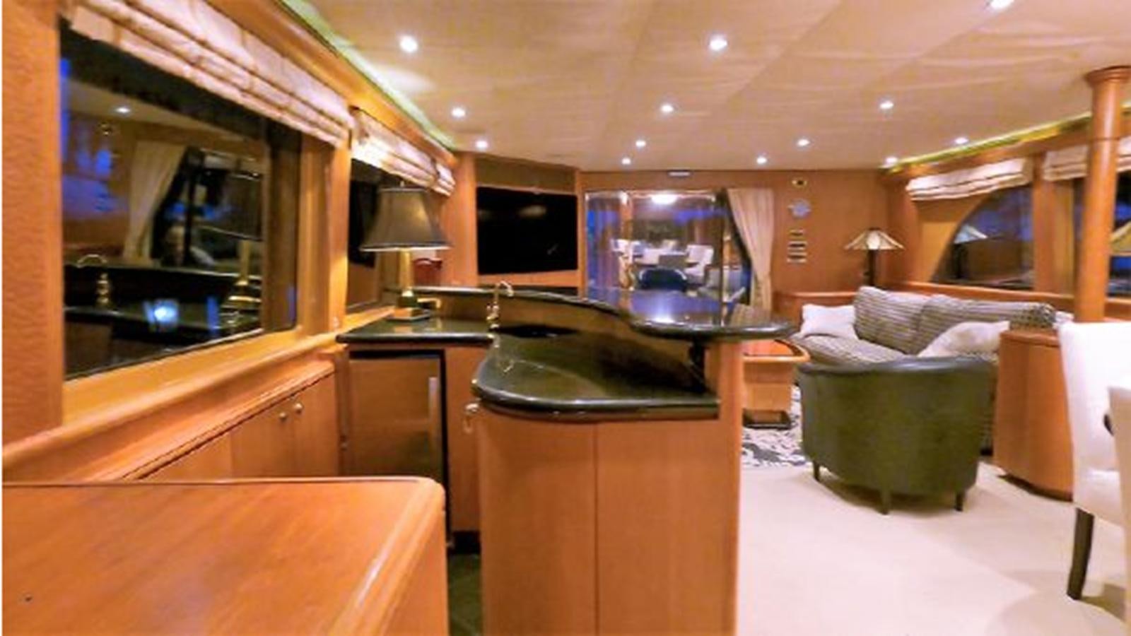a room with a large mirror and a bed aboard 2006 CHEOY LEE MOTOR Yacht for Sale